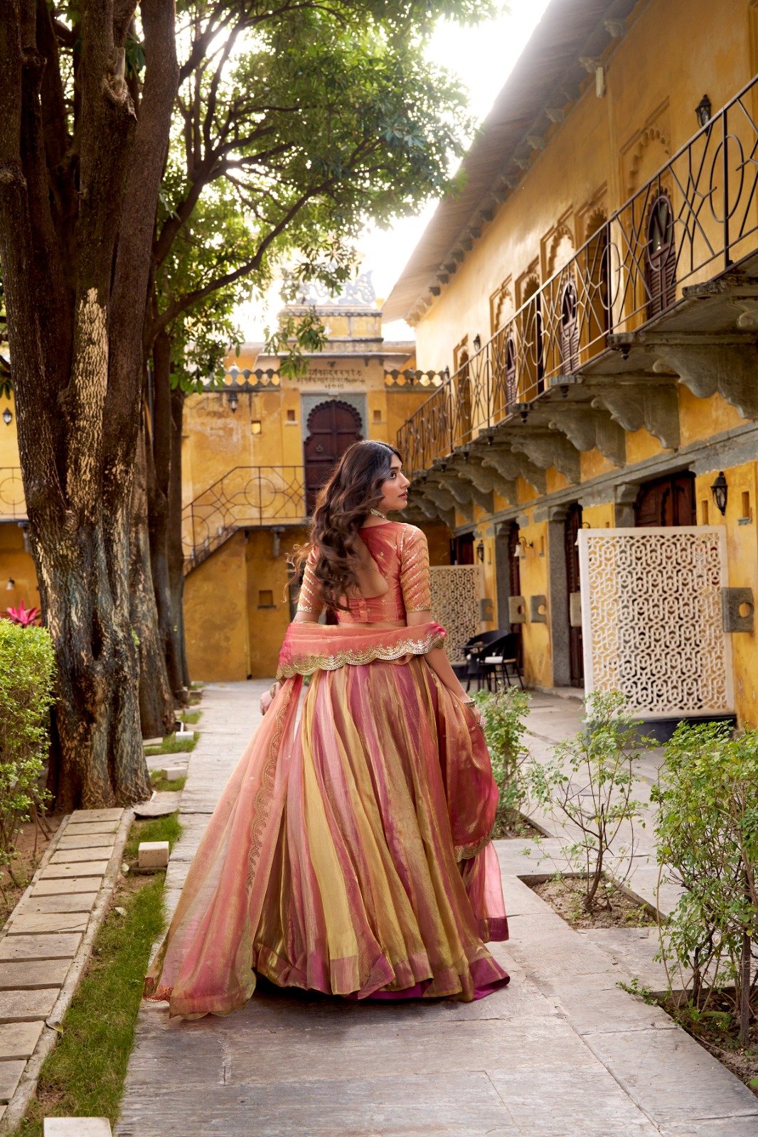the flowing silhouette, delicate embroidery, and ethereal dupatta come together to create a look that feels effortlessly royal the flowing silhouette, delicate embroidery, and ethereal dupatta come together to create a look that feels effortlessly royal