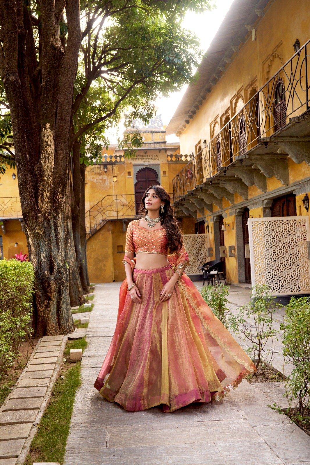 the flowing silhouette, delicate embroidery, and ethereal dupatta come together to create a look that feels effortlessly royal the flowing silhouette, delicate embroidery, and ethereal dupatta come together to create a look that feels effortlessly royal