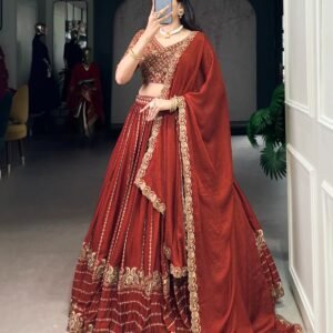 a regal maroon lehenga choli crafted in rangoli9 silk with intricate embroidery and sequins—made to shine at every celebration