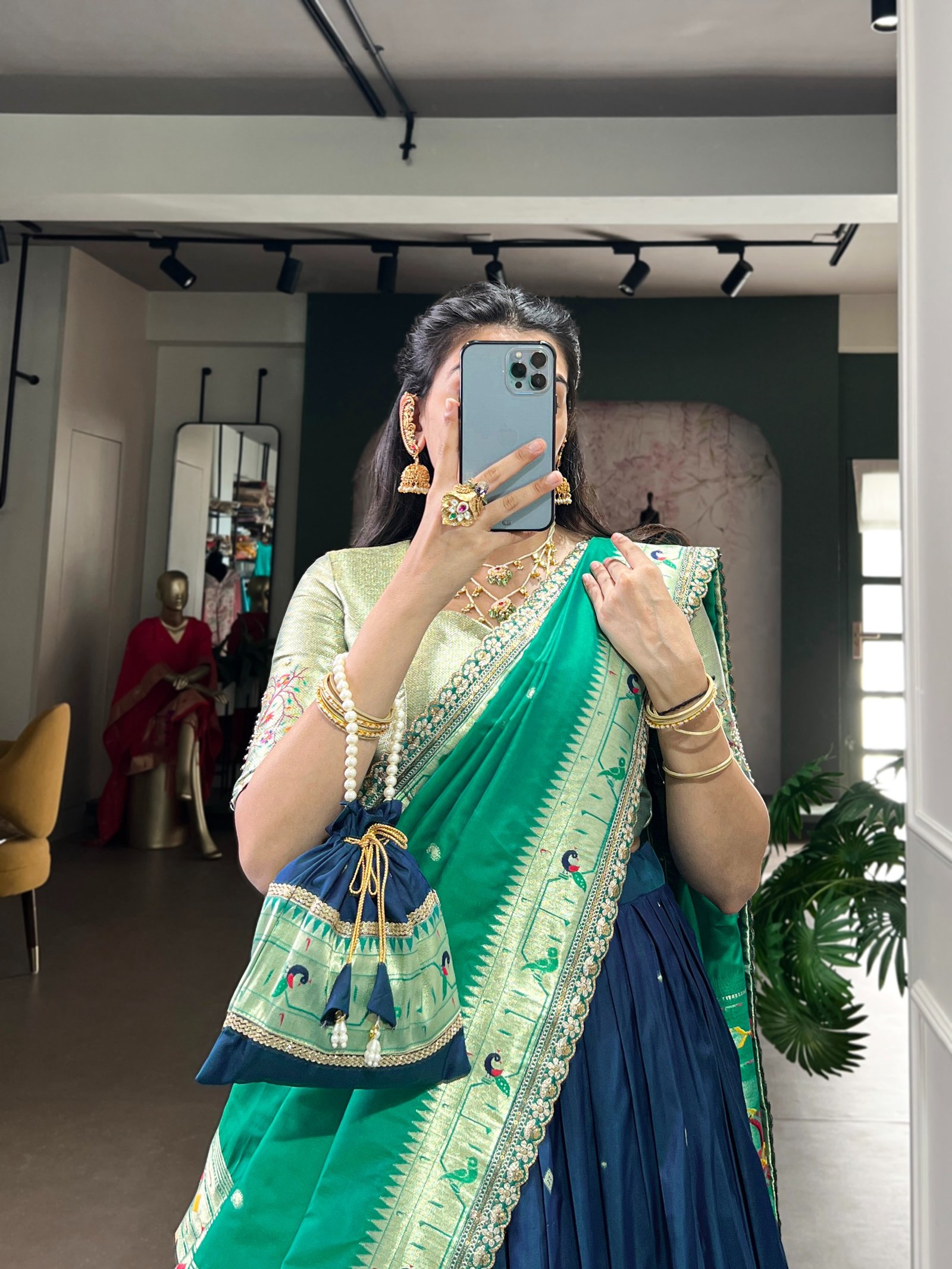 draped in refreshing shades of green, this soft silk lehenga choli shines with intricate zari weaving, delicate sequins, thread embroidery, and an elegant scallop lace border draped in refreshing shades of green, this soft silk lehenga choli shines with intricate zari weaving, delicate sequins, thread embroidery, and an elegant scallop lace border