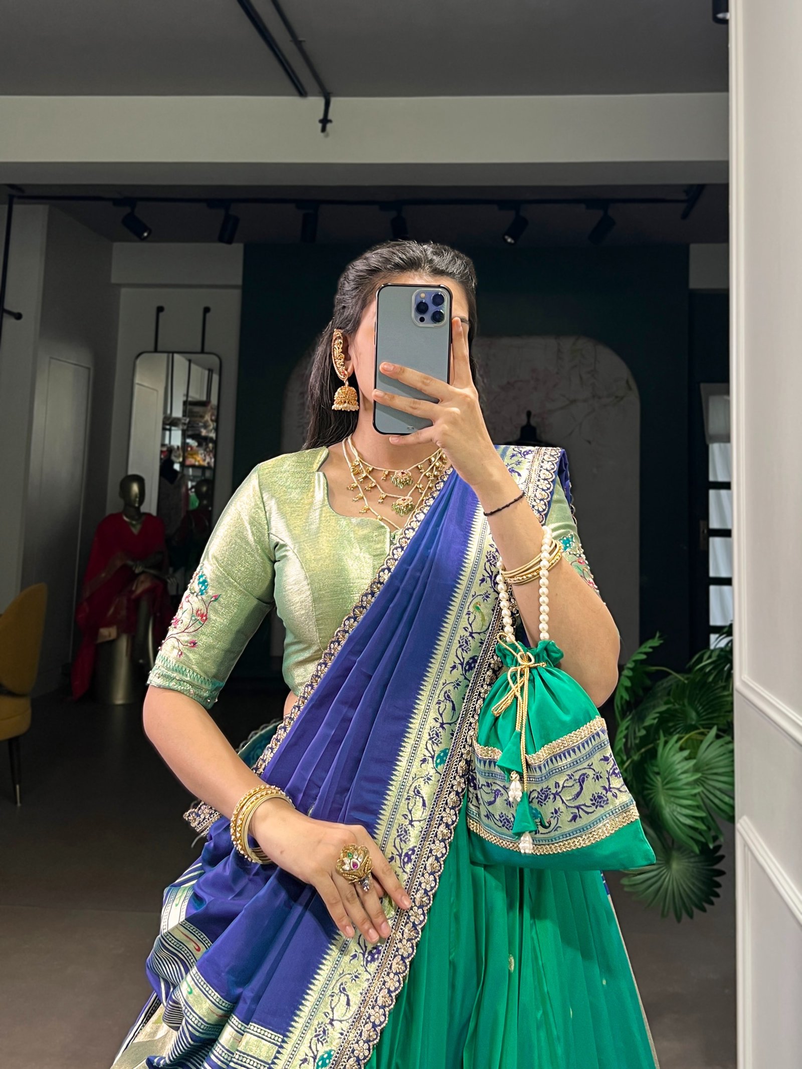 draped in refreshing shades of green, this soft silk lehenga choli shines with intricate zari weaving, delicate sequins, thread embroidery, and an elegant scallop lace border draped in refreshing shades of green, this soft silk lehenga choli shines with intricate zari weaving, delicate sequins, thread embroidery, and an elegant scallop lace border