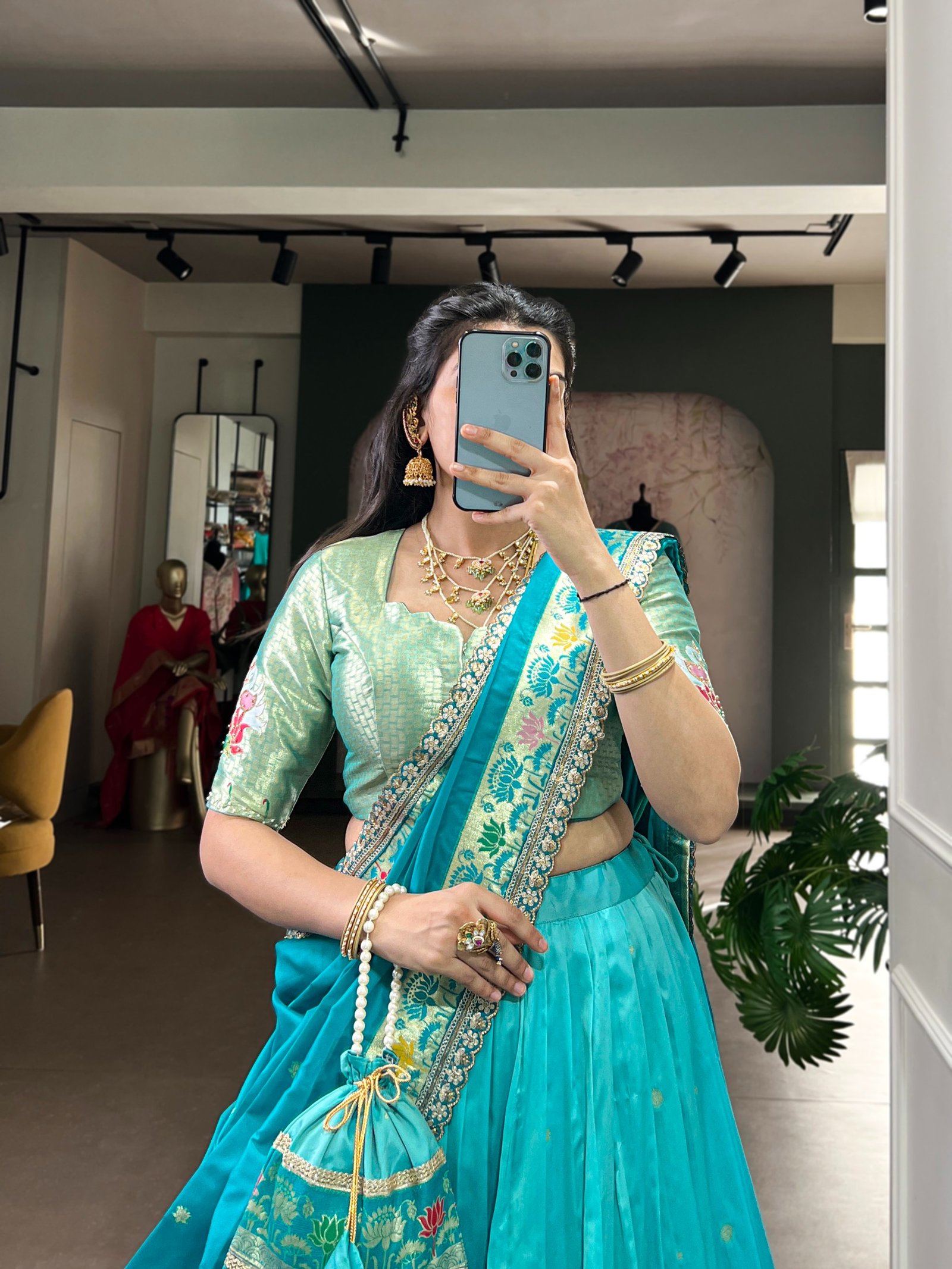 draped in refreshing shades of green, this soft silk lehenga choli shines with intricate zari weaving, delicate sequins, thread embroidery, and an elegant scallop lace border draped in refreshing shades of green, this soft silk lehenga choli shines with intricate zari weaving, delicate sequins, thread embroidery, and an elegant scallop lace border
