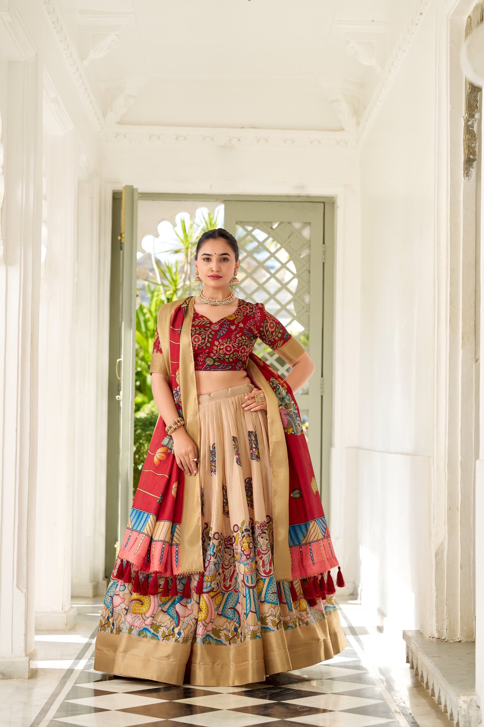dorned in the elegance of dola silk and the intricate charm of kalamkari prints, the lehenga choli whispers tales of tradition and beauty dorned in the elegance of dola silk and the intricate charm of kalamkari prints, the lehenga choli whispers tales of tradition and beauty