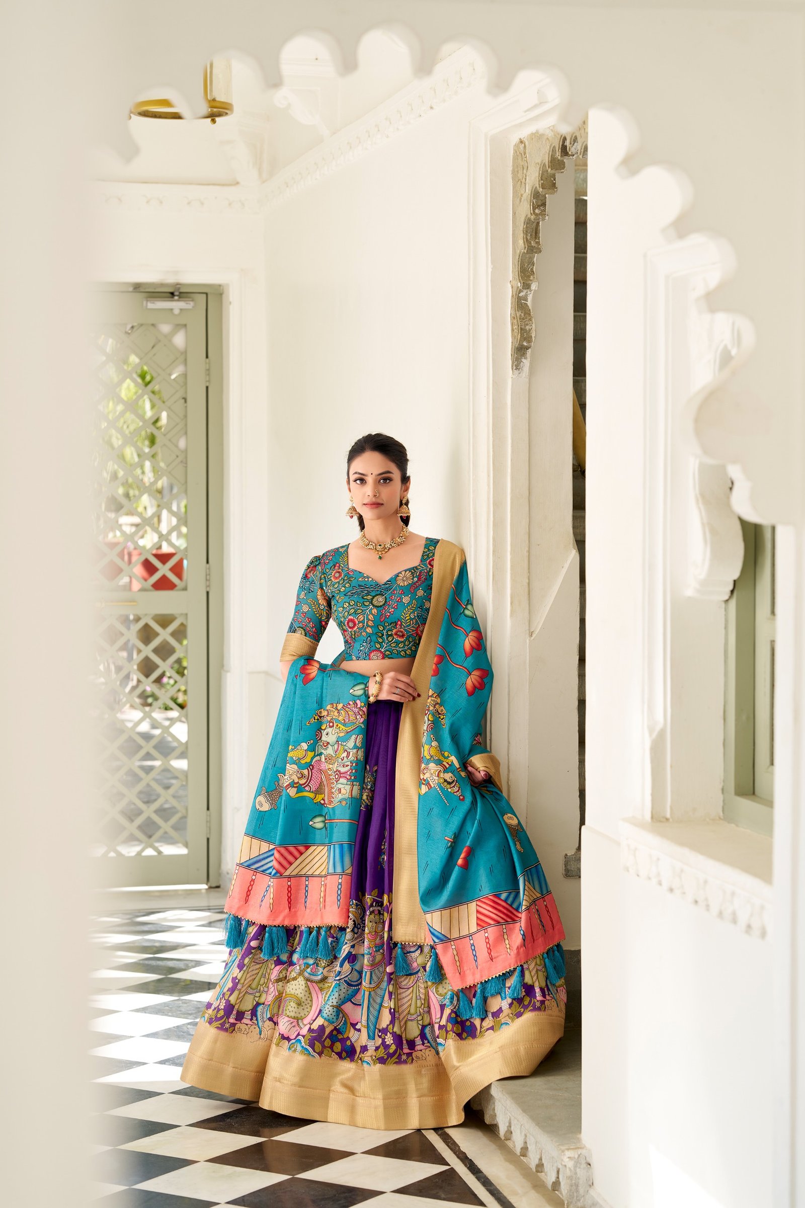 dorned in the elegance of dola silk and the intricate charm of kalamkari prints, the lehenga choli whispers tales of tradition and beauty dorned in the elegance of dola silk and the intricate charm of kalamkari prints, the lehenga choli whispers tales of tradition and beauty