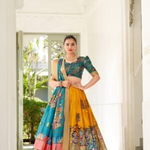 dorned in the elegance of dola silk and the intricate charm of kalamkari prints, the lehenga choli whispers tales of tradition and beauty