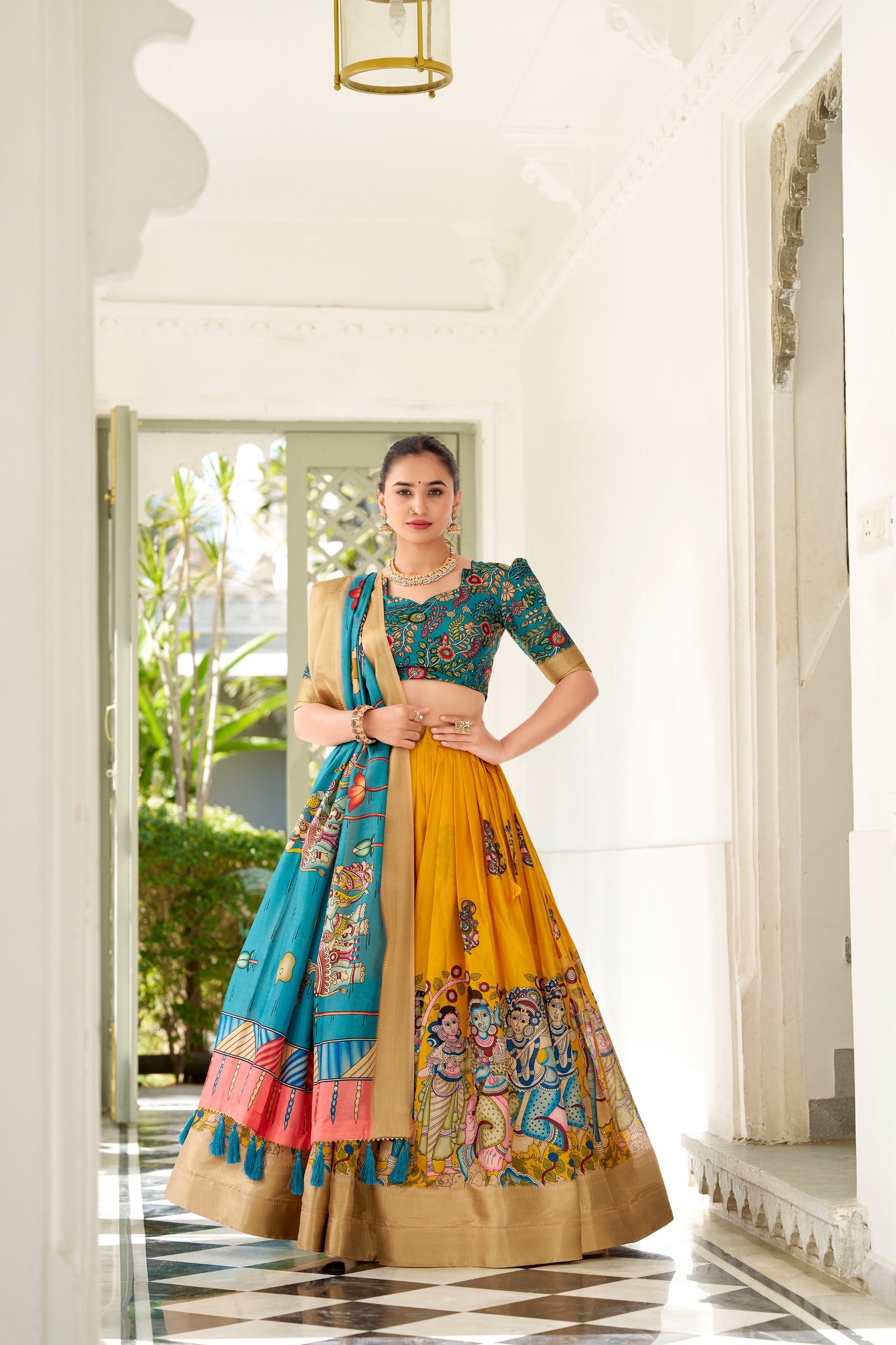dorned in the elegance of dola silk and the intricate charm of kalamkari prints, the lehenga choli whispers tales of tradition and beauty dorned in the elegance of dola silk and the intricate charm of kalamkari prints, the lehenga choli whispers tales of tradition and beauty