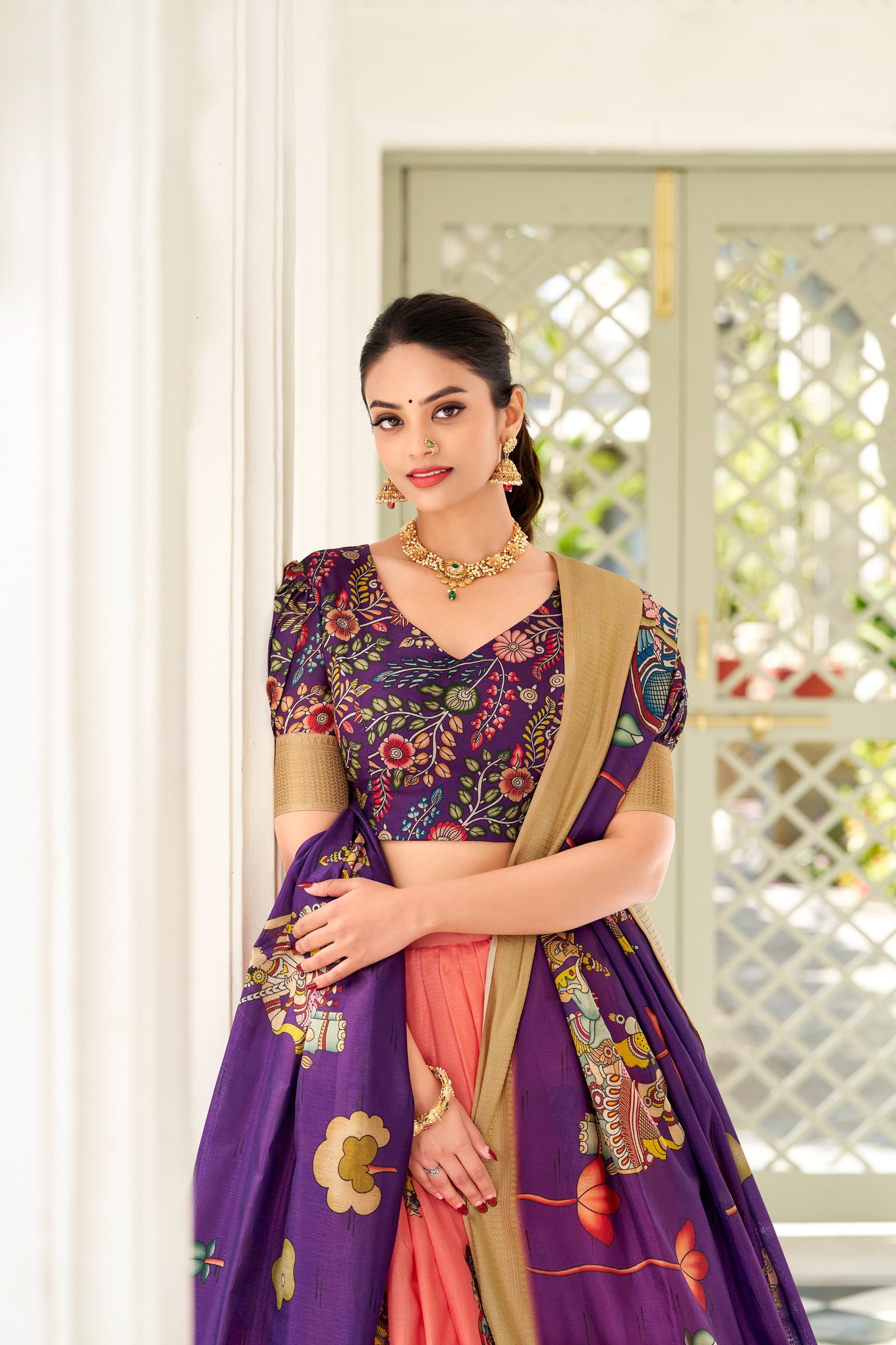 dorned in the elegance of dola silk and the intricate charm of kalamkari prints, the lehenga choli whispers tales of tradition and beauty dorned in the elegance of dola silk and the intricate charm of kalamkari prints, the lehenga choli whispers tales of tradition and beauty