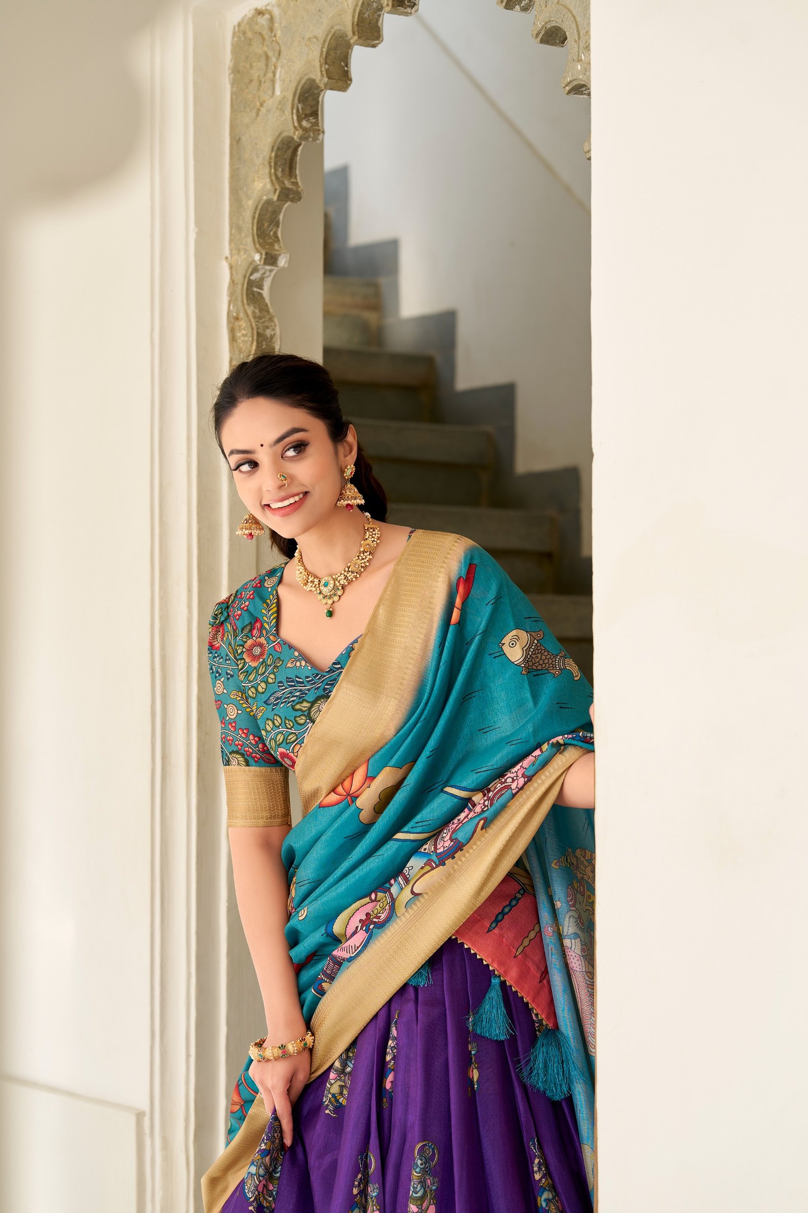 dorned in the elegance of dola silk and the intricate charm of kalamkari prints, the lehenga choli whispers tales of tradition and beauty dorned in the elegance of dola silk and the intricate charm of kalamkari prints, the lehenga choli whispers tales of tradition and beauty