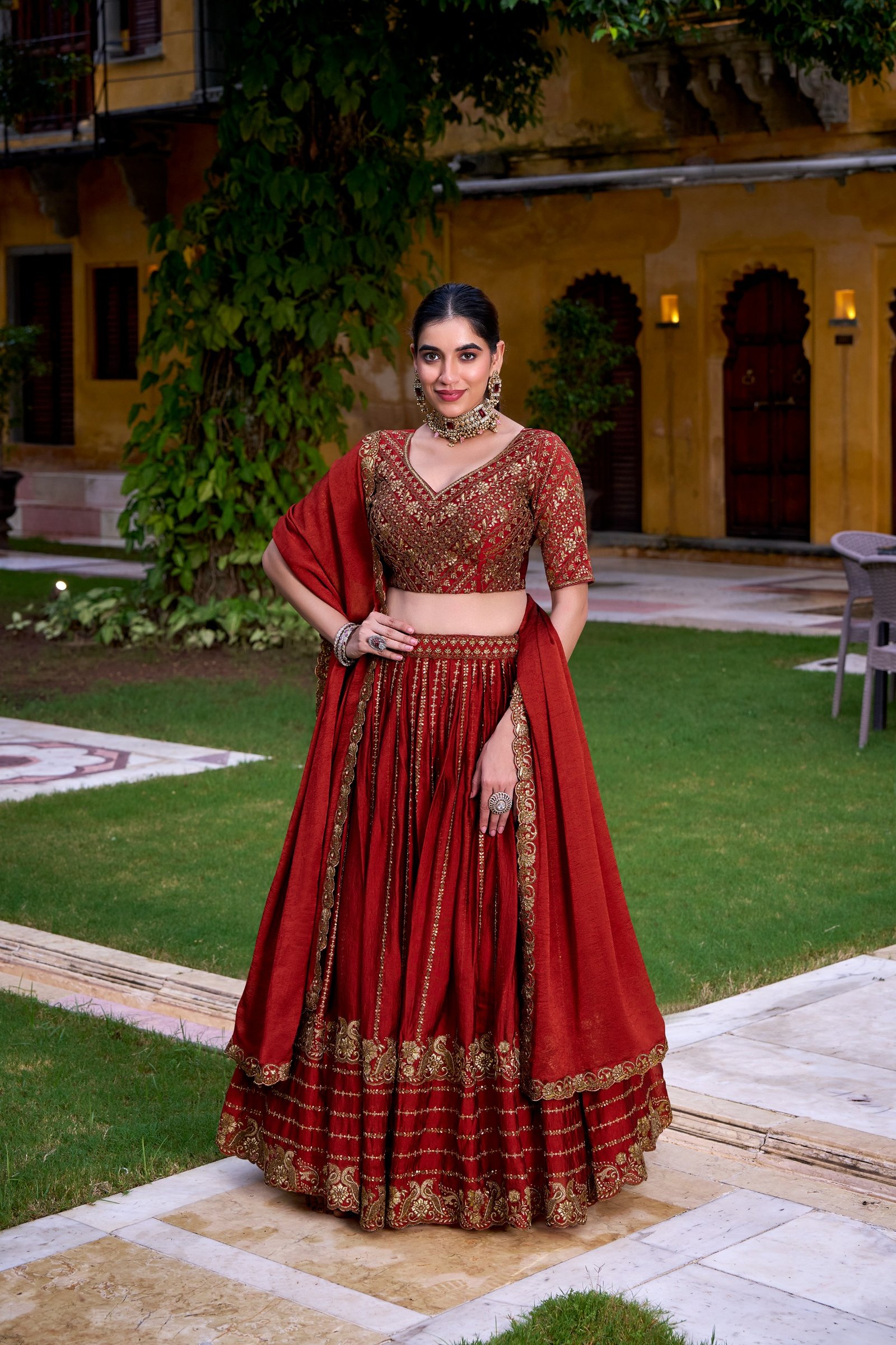 maroon lehenga choli crafted in rangoli silk with intricate embroidery and sequins maroon lehenga choli crafted in rangoli silk with intricate embroidery and sequins