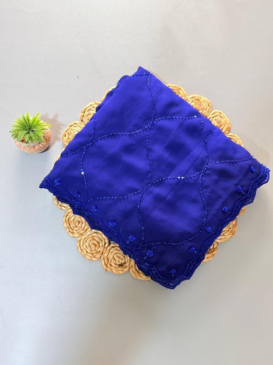pure georgette saree with fully heavy bits sequence work all over saree and designer scalp border pure georgette saree with fully heavy bits sequence work all over saree and designer scalp border
