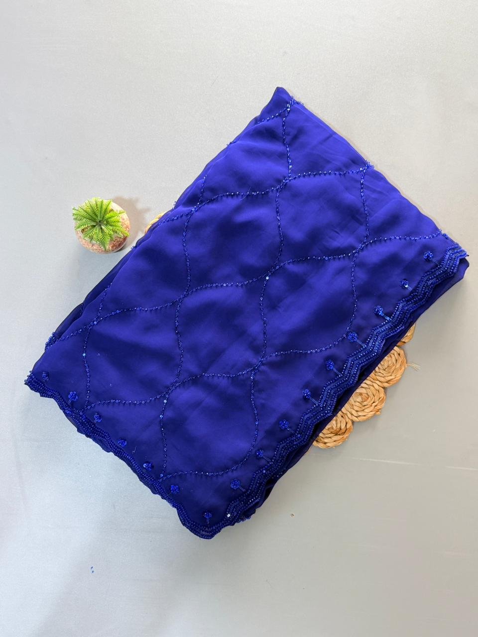 pure georgette saree with fully heavy bits sequence work all over saree and designer scalp border pure georgette saree with fully heavy bits sequence work all over saree and designer scalp border