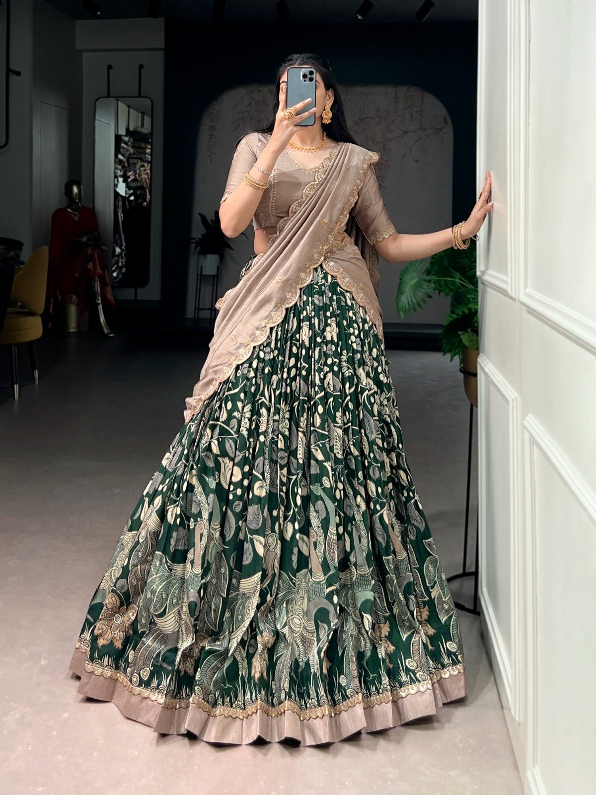 premium tasar silk, detailed kalamkari prints, and an embroidered dupatta, this lehenga set is a perfect choice for refined festive styling. premium tasar silk, detailed kalamkari prints, and an embroidered dupatta, this lehenga set is a perfect choice for refined festive styling.
