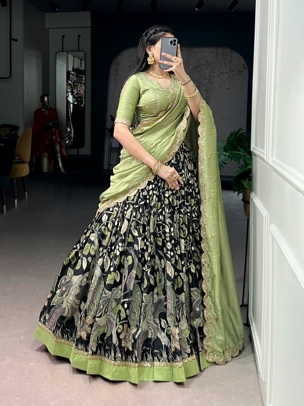 premium tasar silk, detailed kalamkari prints, and an embroidered dupatta, this lehenga set is a perfect choice for refined festive styling. premium tasar silk, detailed kalamkari prints, and an embroidered dupatta, this lehenga set is a perfect choice for refined festive styling.