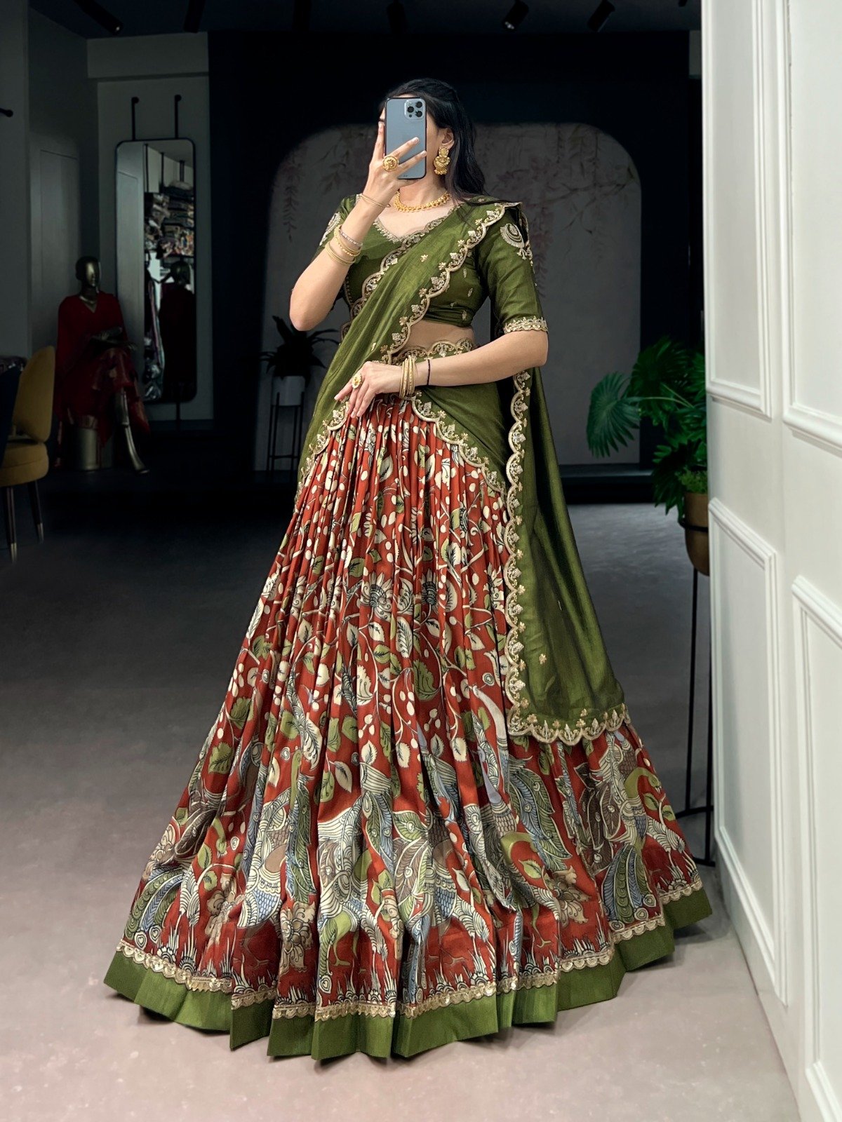 premium tasar silk, detailed kalamkari prints, and an embroidered dupatta, this lehenga set is a perfect choice for refined festive styling. premium tasar silk, detailed kalamkari prints, and an embroidered dupatta, this lehenga set is a perfect choice for refined festive styling.