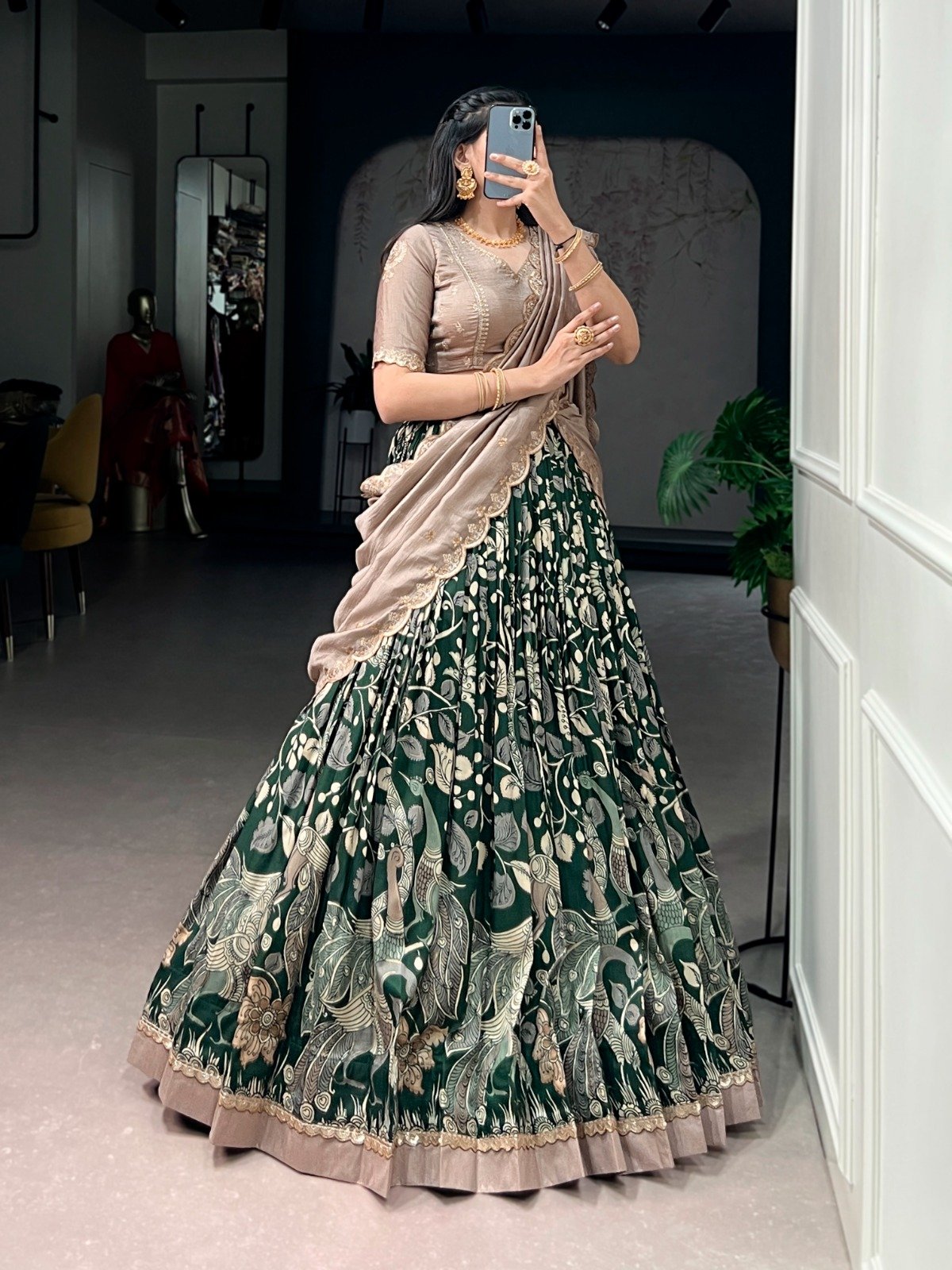 premium tasar silk, detailed kalamkari prints, and an embroidered dupatta, this lehenga set is a perfect choice for refined festive styling. premium tasar silk, detailed kalamkari prints, and an embroidered dupatta, this lehenga set is a perfect choice for refined festive styling.