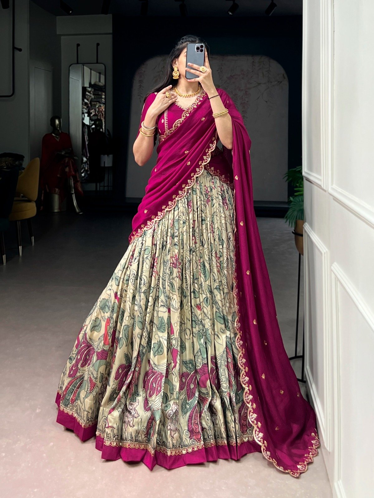 premium tasar silk, detailed kalamkari prints, and an embroidered dupatta, this lehenga set is a perfect choice for refined festive styling. premium tasar silk, detailed kalamkari prints, and an embroidered dupatta, this lehenga set is a perfect choice for refined festive styling.