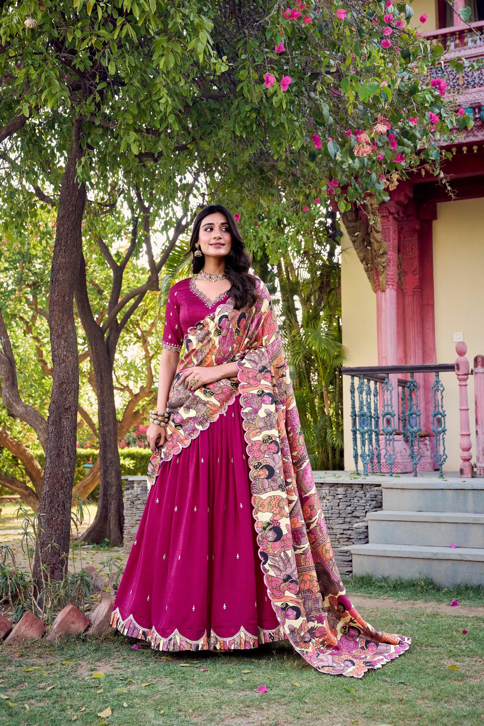 featuring premium tasar silk, detailed kalamkari prints, and an embroidered dupatta, this lehenga set is a perfect choice for refined festive styling. featuring premium tasar silk, detailed kalamkari prints, and an embroidered dupatta, this lehenga set is a perfect choice for refined festive styling.