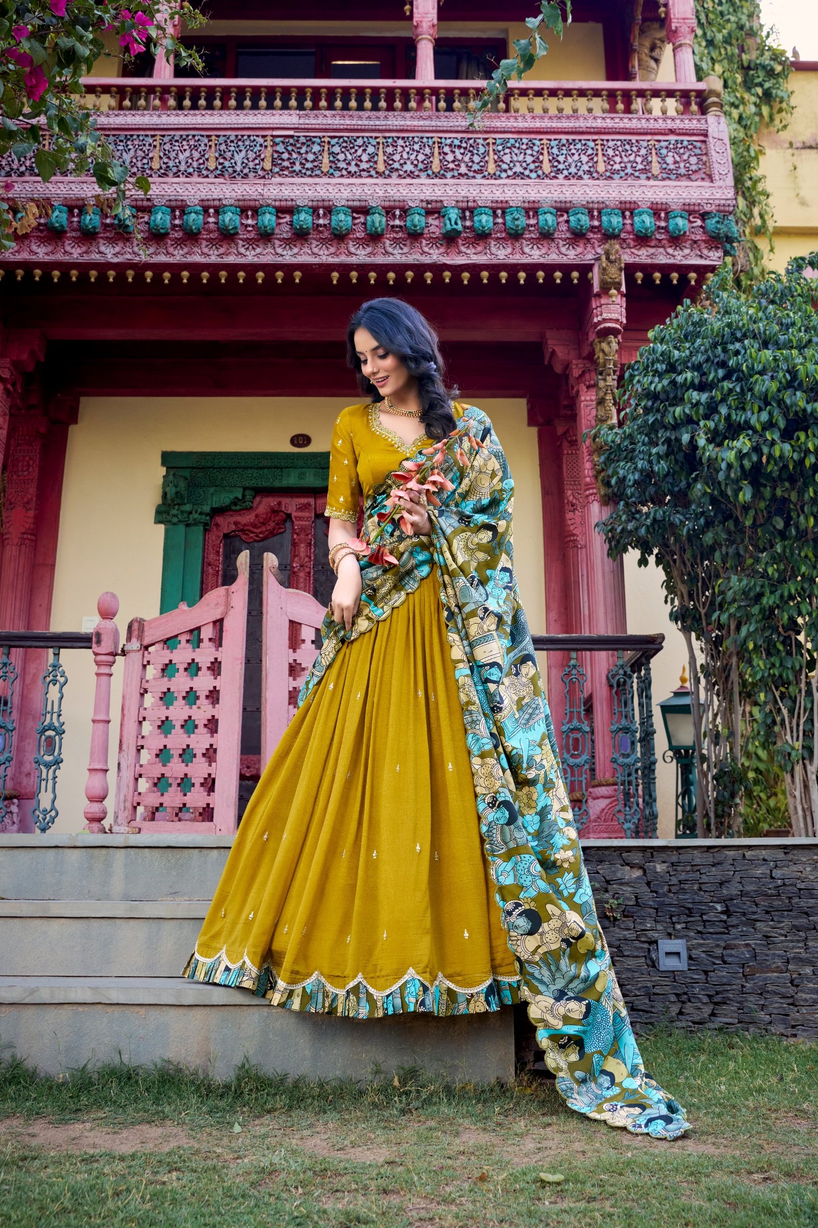 featuring premium tasar silk, detailed kalamkari prints, and an embroidered dupatta, this lehenga set is a perfect choice for refined festive styling. featuring premium tasar silk, detailed kalamkari prints, and an embroidered dupatta, this lehenga set is a perfect choice for refined festive styling.