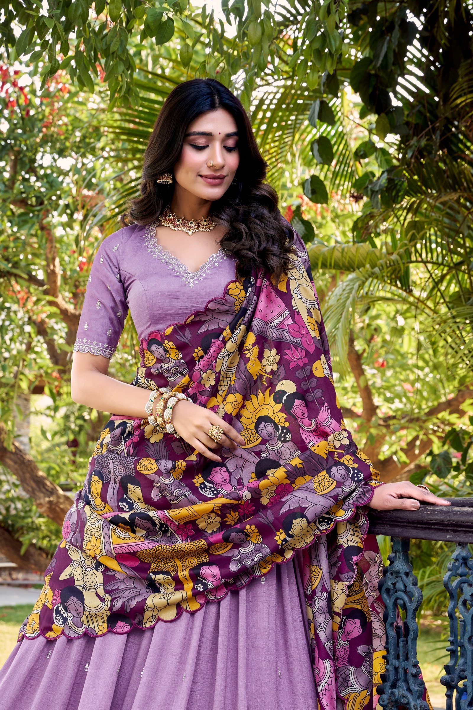 featuring premium tasar silk, detailed kalamkari prints, and an embroidered dupatta, this lehenga set is a perfect choice for refined festive styling. featuring premium tasar silk, detailed kalamkari prints, and an embroidered dupatta, this lehenga set is a perfect choice for refined festive styling.