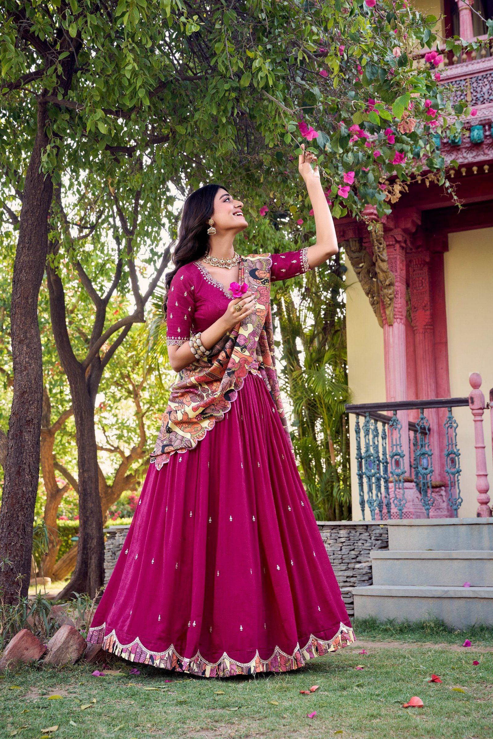 featuring premium tasar silk, detailed kalamkari prints, and an embroidered dupatta, this lehenga set is a perfect choice for refined festive styling. featuring premium tasar silk, detailed kalamkari prints, and an embroidered dupatta, this lehenga set is a perfect choice for refined festive styling.