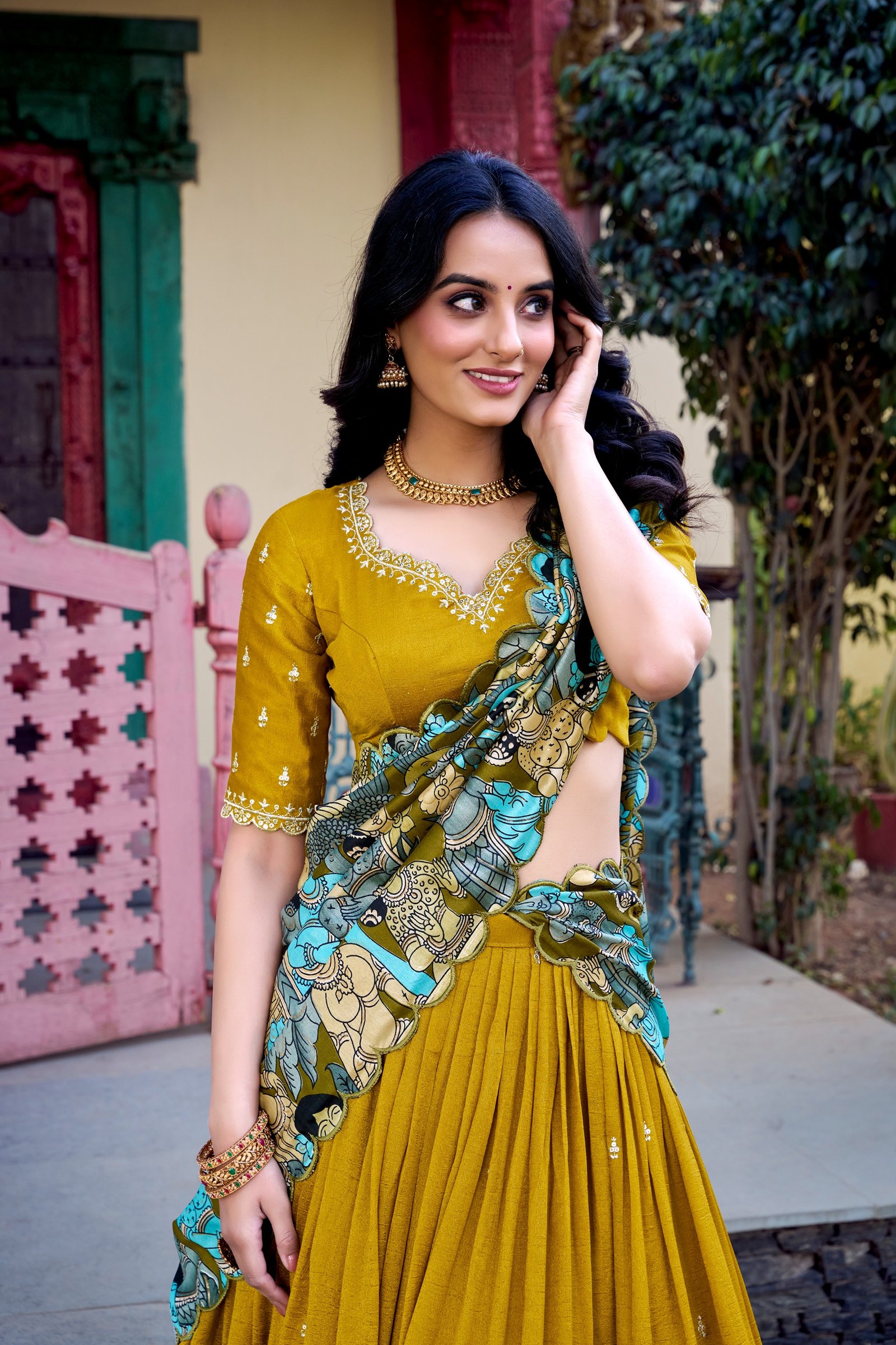 featuring premium tasar silk, detailed kalamkari prints, and an embroidered dupatta, this lehenga set is a perfect choice for refined festive styling. featuring premium tasar silk, detailed kalamkari prints, and an embroidered dupatta, this lehenga set is a perfect choice for refined festive styling.