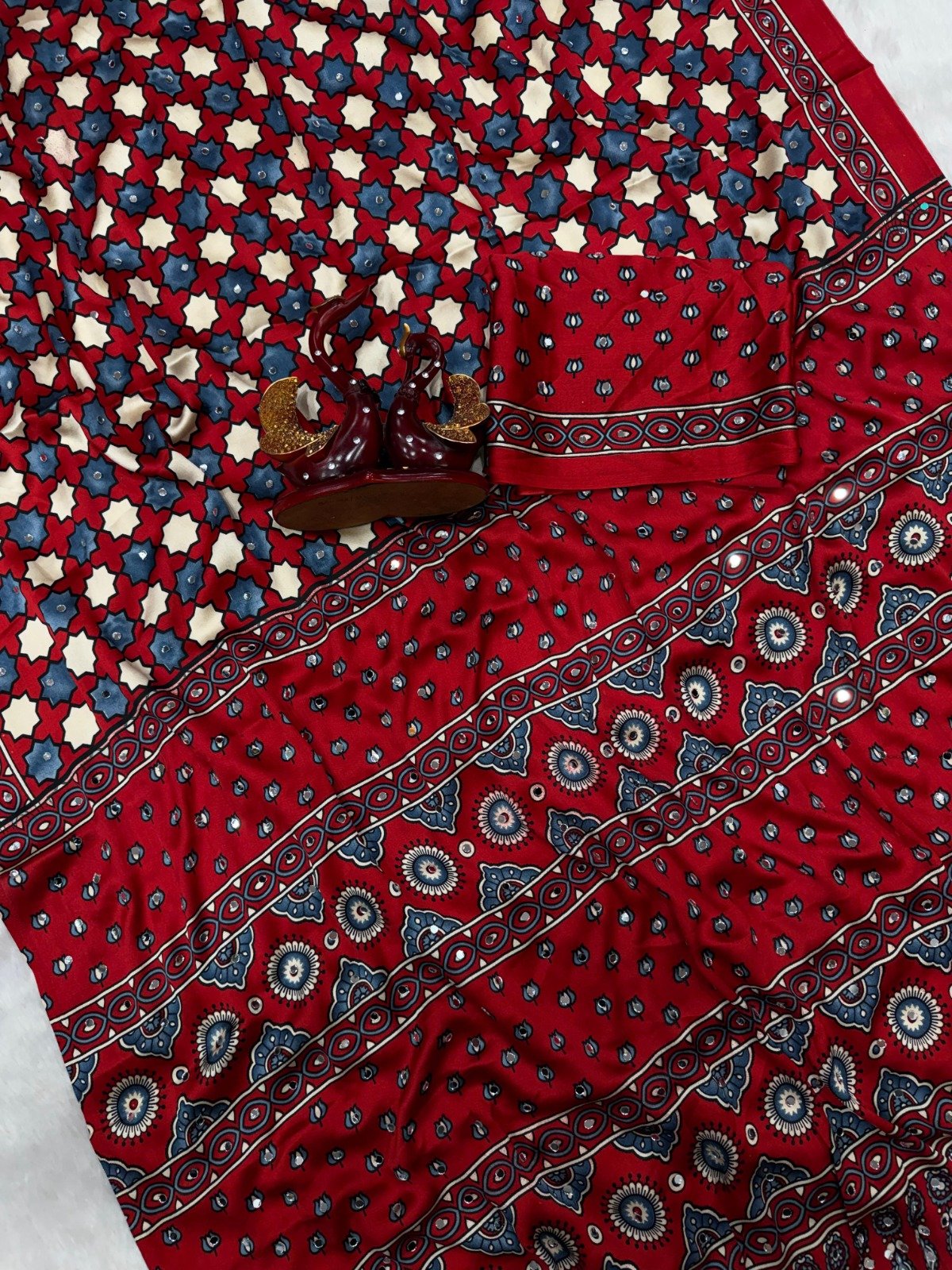 presenting most demanding saree soft japan satin ajarakh print with real mirror work presenting most demanding saree soft japan satin ajarakh print with real mirror work