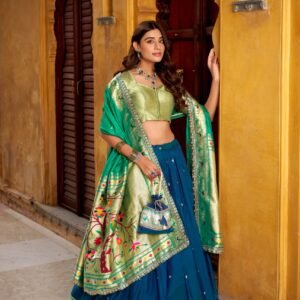 sequins, thread embroidery, and an elegant scallop lace border lehenga