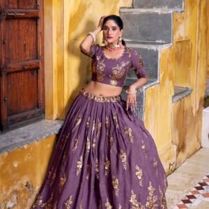 lehenga golden sequins catching the light, thread embroidery detailing every curve