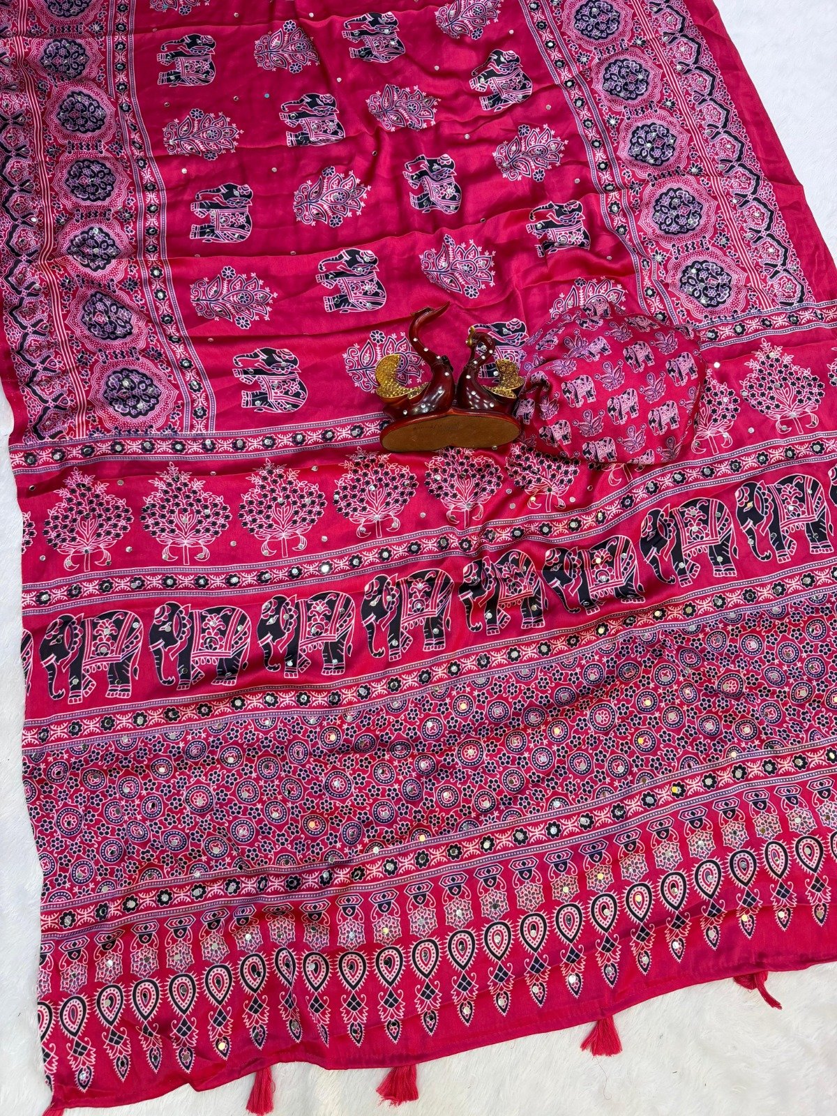 presenting most demanding saree heavy japan satin ajarakh print with real mirror work and latkan presenting most demanding saree heavy japan satin ajarakh print with real mirror work and latkan