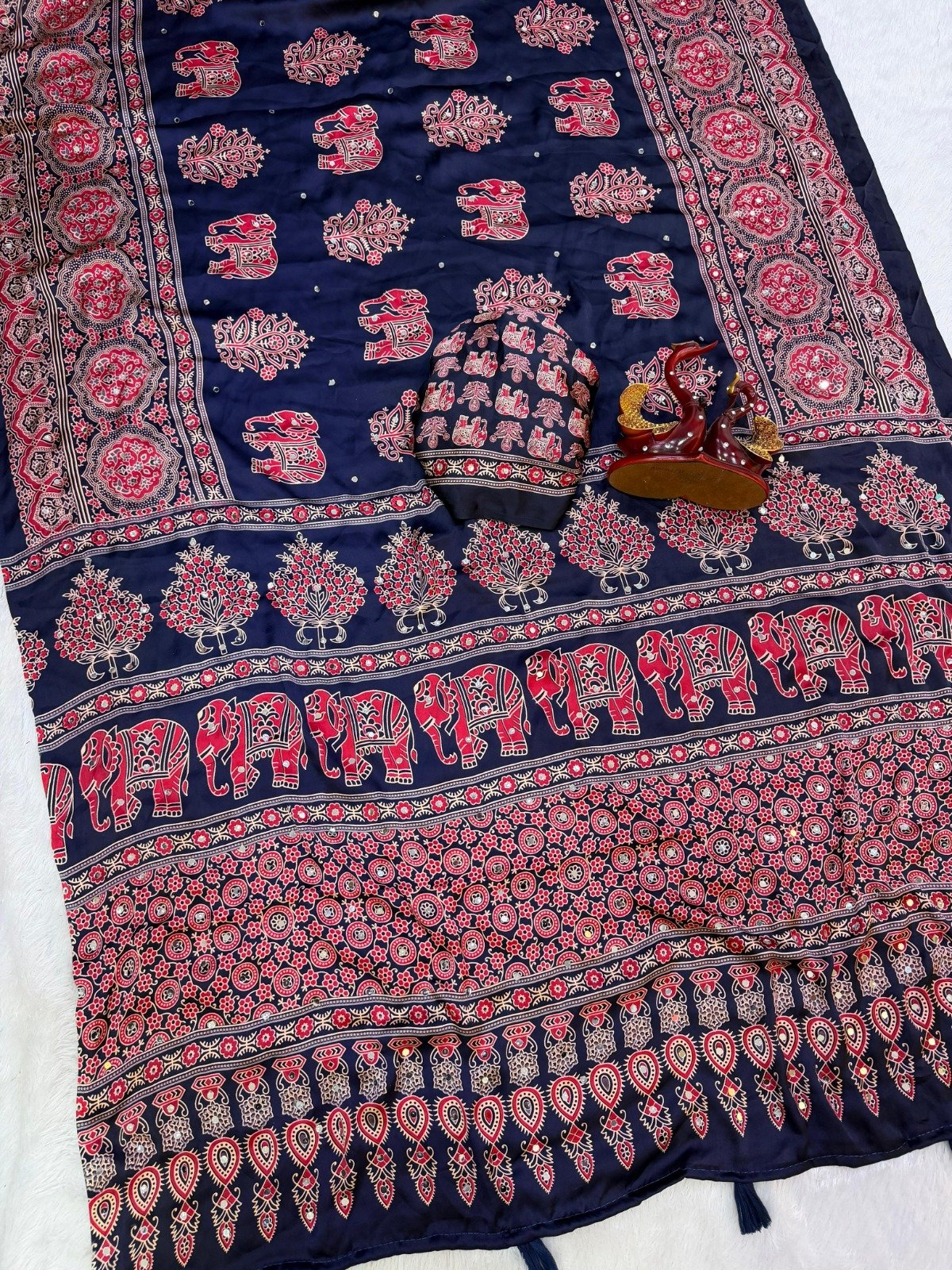 presenting most demanding saree heavy japan satin ajarakh print with real mirror work and latkan presenting most demanding saree heavy japan satin ajarakh print with real mirror work and latkan