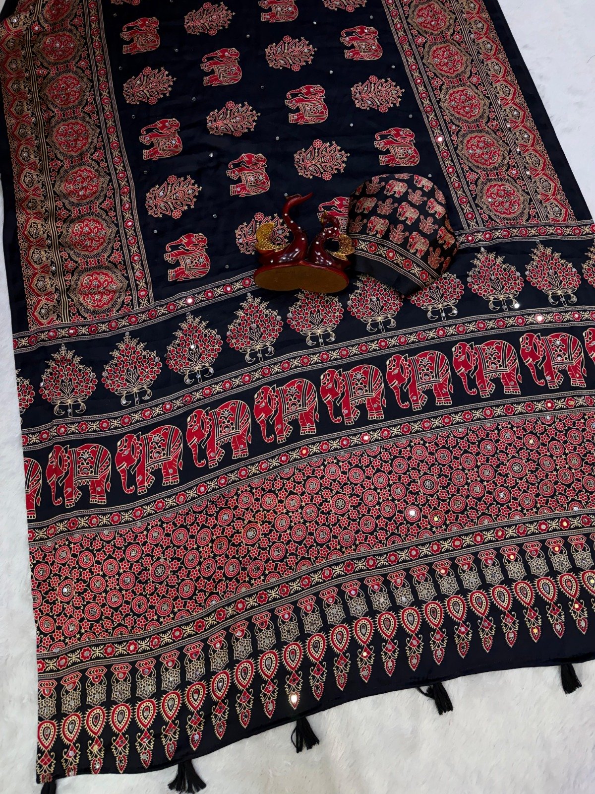 presenting most demanding saree heavy japan satin ajarakh print with real mirror work and latkan presenting most demanding saree heavy japan satin ajarakh print with real mirror work and latkan