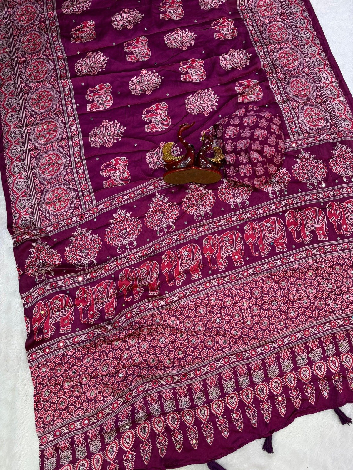 presenting most demanding saree heavy japan satin ajarakh print with real mirror work and latkan presenting most demanding saree heavy japan satin ajarakh print with real mirror work and latkan