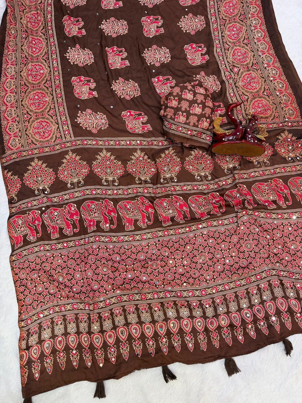 presenting most demanding saree heavy japan satin ajarakh print with real mirror work and latkan presenting most demanding saree heavy japan satin ajarakh print with real mirror work and latkan