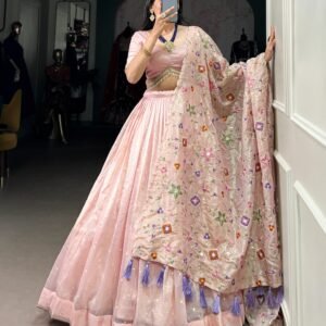 lehenga glowing in pink over bettis work with lace border